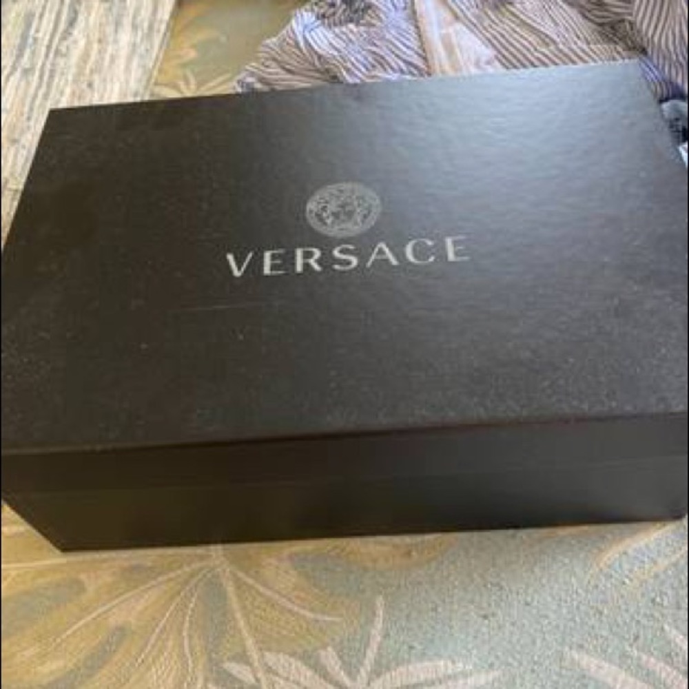 Black and gold Medusa head Versace slides